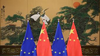 Flags of European Union and China are pictured during the China-EU summit at the Great Hall of the People in Beijing, China. File image/ Reuters