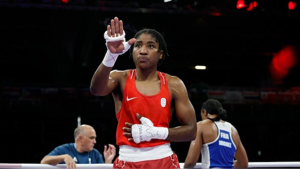  Boxer Cindy Ngamba wins Refugee Olympic Team's first-ever medal