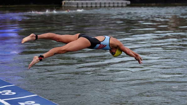 Belgian triathlete 'sick' after Olympic race in Seine, competition to go ahead as scheduled