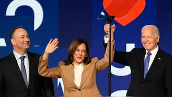US President Joe Biden, Democratic presidential candidate and US Vice President Kamala Harris and Second Gentleman Doug Emhoff stand on stage during Day one of the Democratic National Convention (DNC) in Chicago, Illinois, US, August 19, 2024. Reuters