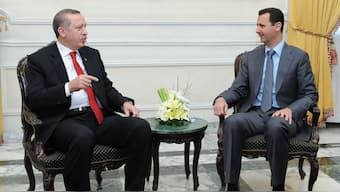 File photo of Turkish President Recep Tayyip Erdogan meeting Syrian President Bashar al-Assad. Source: REUTERS.