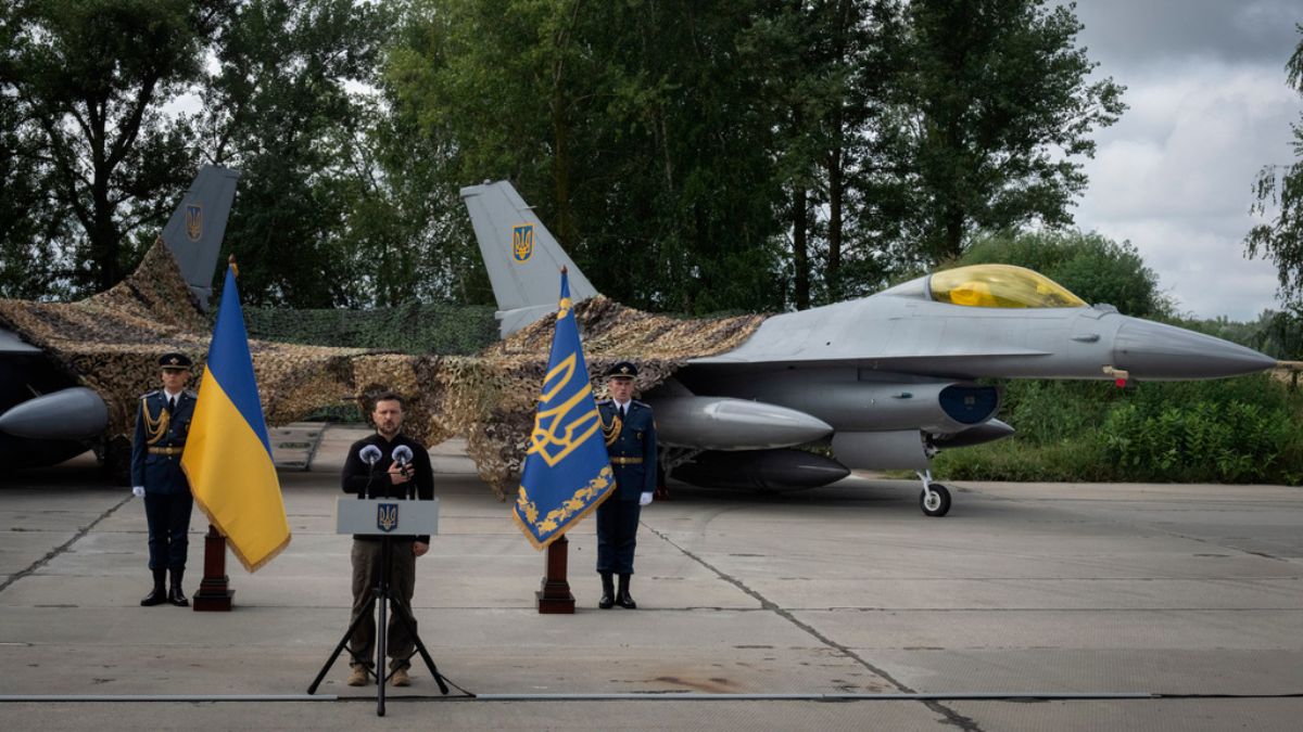 Ukraine's President Volodymyr Zelenskyy talks on the occasion of the Air Forces Day standing against the background of Ukraine's Air Force's F-16 fighter jets in an undisclosed location in Ukraine. AP Ukraine's President Volodymyr Zelenskyy talks on the occasion of the Air Forces Day standing against the background of Ukraine's Air Force's F-16 fighter jets in an undisclosed location in Ukraine. AP