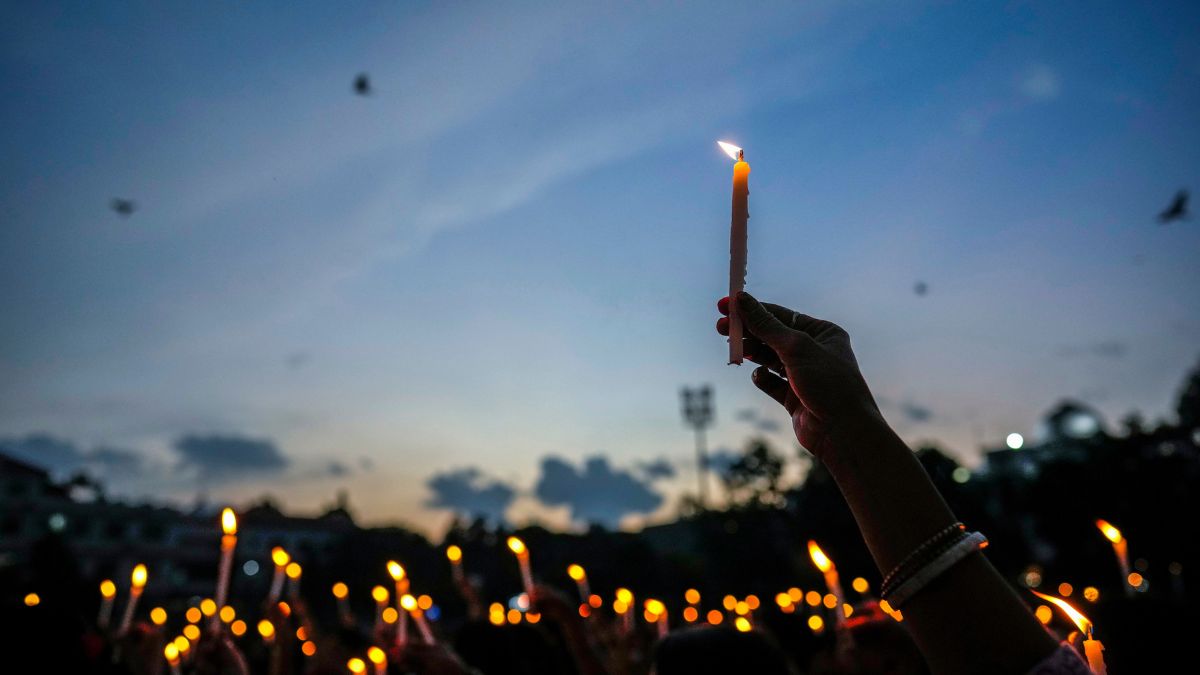 Kolkata medic's rape-murder: Women hold candles as they stage a protest against the rape and killing of a trainee doctor at a government hospital last week, in Guwahati, India, Friday, Aug. 16, 2024. (AP Photo) Kolkata medic's rape-murder: Women hold candles as they stage a protest against the rape and killing of a trainee doctor at a government hospital last week, in Guwahati, India, Friday, Aug. 16, 2024. (AP Photo)
