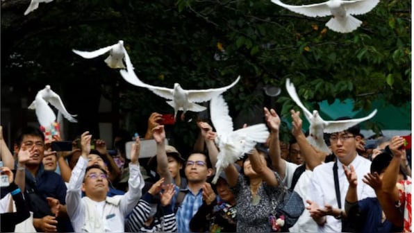 Japan marks anniversary of defeat in WWII with minister visits to controversial war shrine