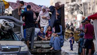 Palestinians displaced by the Israeli air and ground offensive on the Gaza Strip flee from Hamad City, following an evacuation order by the Israeli army to leave parts of the southern area of Khan Younis, Sunday, Aug. 11, 2024. Image- AP