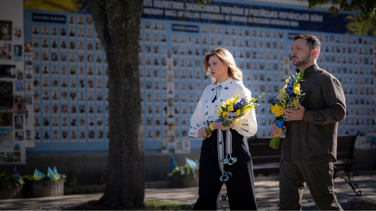 In this photo provided by the Ukrainian Presidential Press Office, Ukrainian President Volodymyr Zelenskyy and his wife Olena lay flowers at the Memorial Wall of Fallen Defenders of Ukraine in Russian-Ukrainian War during celebration of the Ukrainian Independence Day in Kyiv, Ukraine, Saturday, Aug. 24, 2024.