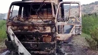 A view shows a charred vehicle, after separatist militants conducted deadly attacks, according to officials, in Balochistan province, Pakistan, August 26, 2024, in this screengrab obtained from a video. Reuters