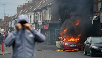 A car burns during an anti-immigration protest in Middlesbrough, England, Sunday Aug. 4, 2024. - Image- AP