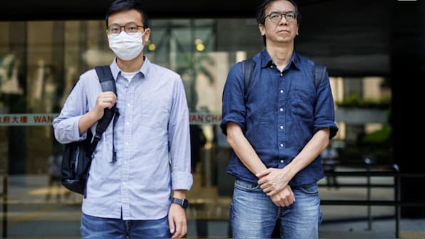 Two Hong Kong journalists convicted of sedition, a first since 1997 China handover