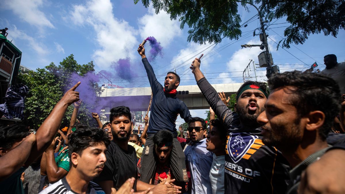 Protesters shout slogans as they celebrate after getting the news of Prime Minister Sheikh Hasina’s resignation, in Dhaka, Bangladesh, Monday, Aug. 5, 2024.