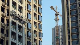 New apartment buildings are seen under construction in Yichang, Hubei province. File Image- Reuters 