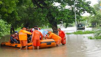 In the two states most severely affected, Vadodara (8,361) and Panchmahals (4,000), more than 12,000 people were relocated on Tuesday. Image Courtesy: @06NDRF/X