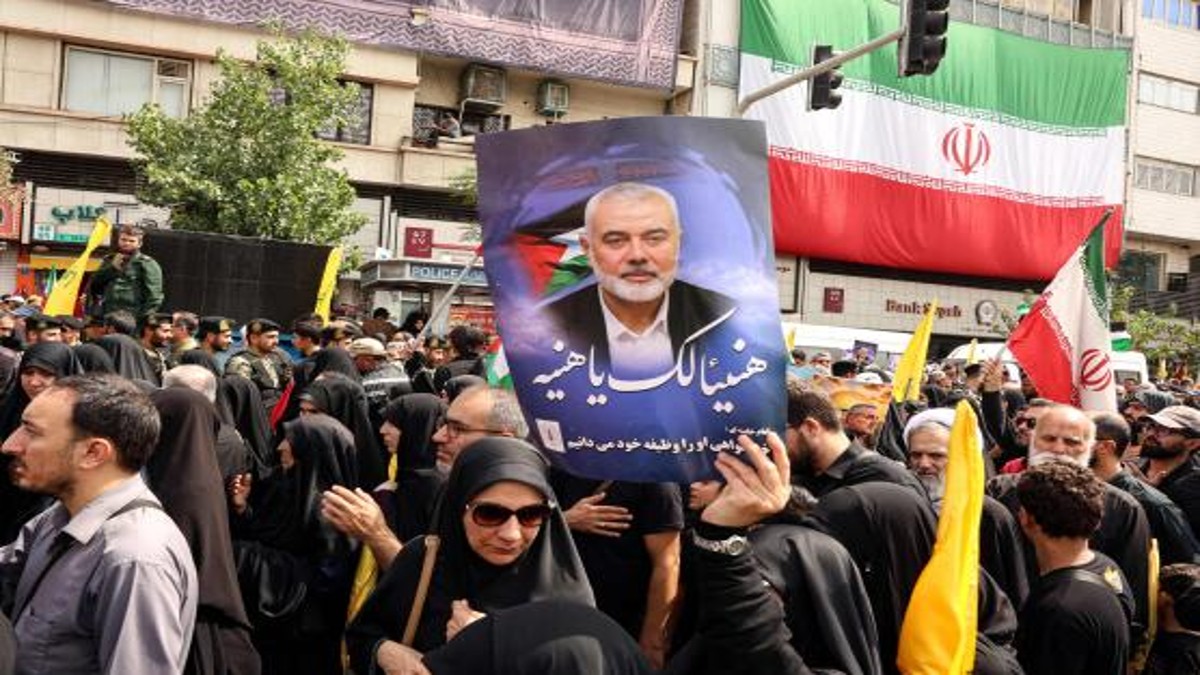 Iranians hold up a portrait of Ismail Haniyeh at his funeral, Tehran, August 1, 2024. Image: AFP Iranians hold up a portrait of Ismail Haniyeh at his funeral, Tehran, August 1, 2024. Image: AFP