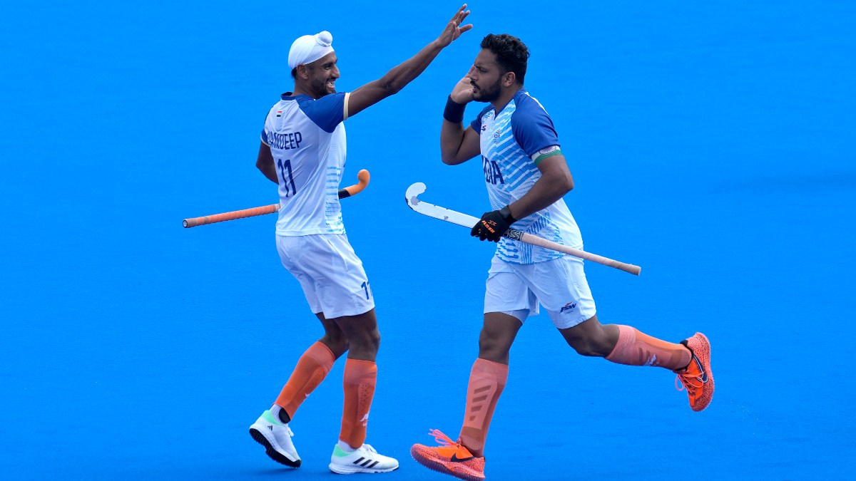 India captain Harmanpreet Singh celebrates after scoring his second goal, successfully converting a penalty stroke, during the Paris Olympics men's hockey Pool B clash against Australia. AP India captain Harmanpreet Singh celebrates after scoring his second goal, successfully converting a penalty stroke, during the Paris Olympics men's hockey Pool B clash against Australia. AP
