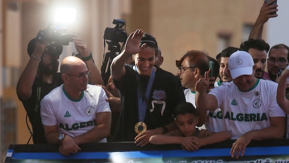 Algerian boxer Imane Khelif welcomed with huge crowds back home after winning gold in Paris Olympics