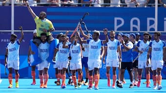 India captain Harmanpreet Singh carries veteran goalkeeper PR Sreejesh, who made his final international appearance on Thursday, on his shoulders during the team's lap of honour after their 2-1 victory over Spain in the Paris Olympics men's hockey bronze medal match. AP