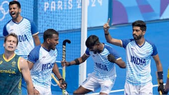 Members of the Indian team celebrate after the final hooter goes off in their Paris Olympics Pool B match against Australia, resulting in a 3-2 victory. AP