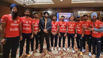 Former captain Jagbir Singh with Indian hockey team players during a ceremony. Image: Jagbir Singh on X