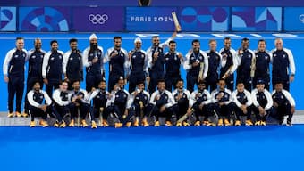 Members of the Indian men's hockey team pose with their bronze medals during the men's hockey medal ceremony in the Paris Olympics on Thursday. AP