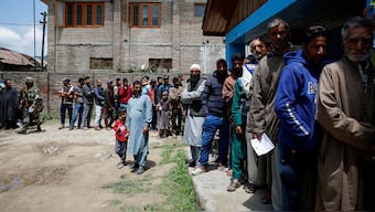 (File) People stand in line to vote at a polling station during the fourth general election phase, in south Kashmir's Pulwama district, May 13, 2024. Reuters