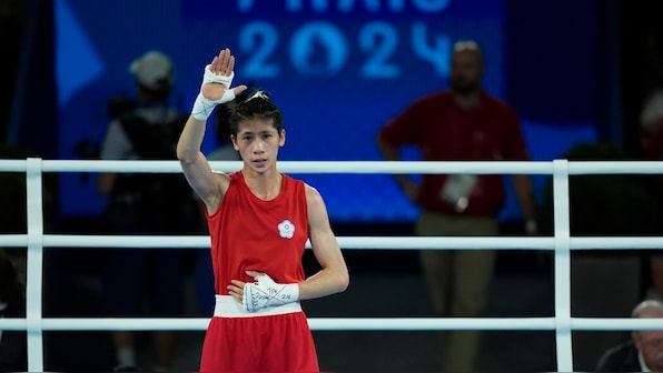  Boxer Lin Yu-ting moves to 57kg final amid gender row as Quincy Hall lands 400m track title