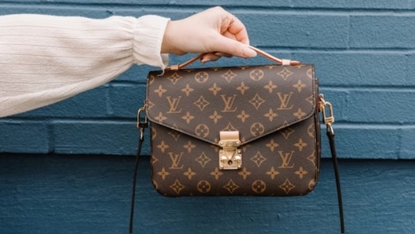 Chinese woman refuses to put Louis Vuitton bag under seat, kicked off flight