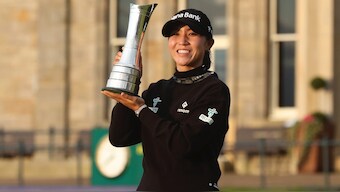 Lydia Ko poses with the trophy after winning the Women's British Open golf championship at St. Andrews, Scotland. AP