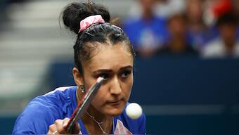 Manika Batra beat Bernadette Szocs of Romania in their singles match during the women's team competition of the Paris Olympics. Reuters