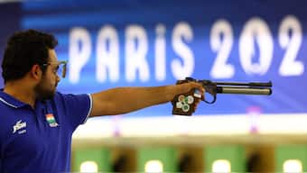 India's Manish Narwal competes in the men's 10m air pistol SH1 event at the Paralympic Games in Paris. Reuters