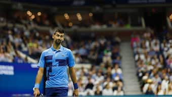 Novak Djokovic looks at a replay between points against Alexei Popyrin in a men's singles match at the US Open. USA TODAY Sports/Reuters