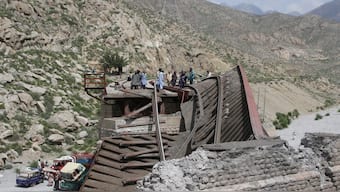 Workers stand on damaged railway tracks as they repair them, a day after separatist militants conducted deadly attacks, in Bolan district of Pakistan's restive province of Balochistan, Pakistan, on August 27, 2024. File image/ Reuters 