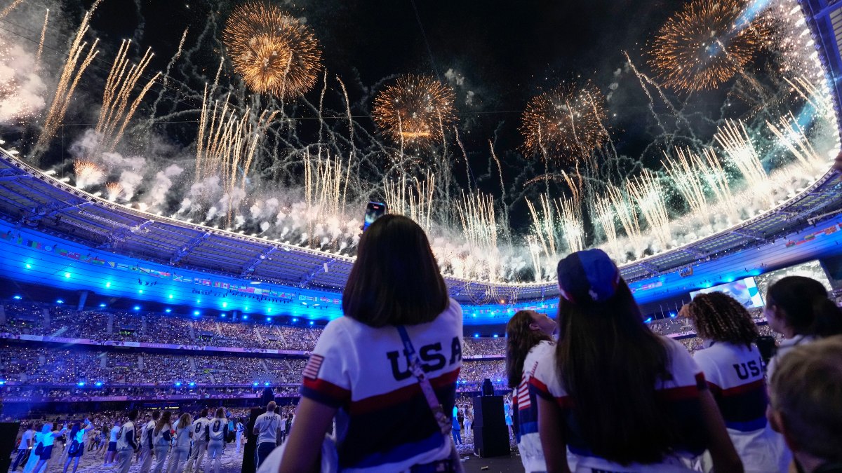 Athletes from the United States watch as the Paris Olympics Closing Ceremony concludes with a spectacular display of fireworks at Stade de France. AP Athletes from the United States watch as the Paris Olympics Closing Ceremony concludes with a spectacular display of fireworks at Stade de France. AP