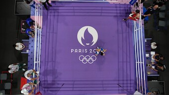 Italy's Angela Carini (C)  reacts after she abandoned her fight against Algeria's Imane Khelif in their women's 66kg preliminary boxing match at the 2024 Summer Olympics in Paris. AP