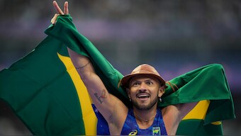 Brazil's Petrucio Ferreira dos Santos celebrates after winning the men's 100m T47 race at the Paralympic Games in Paris. AP