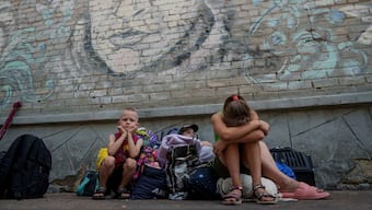 People wait for evacuation in Pokrovsk, Donetsk region, Ukraine, on August 23, 2024. AP