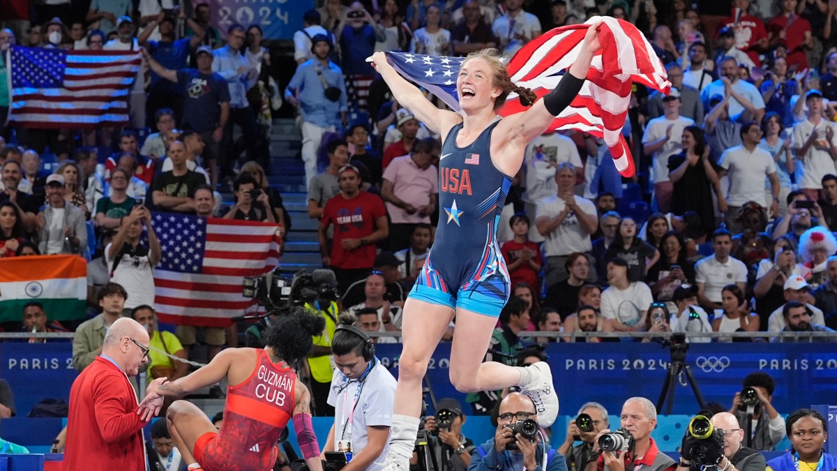 Sarah Hildebrandt of USA celebrates after winning the gold medal in women's 50kg wrestling at Paris Olympics. She was due to face Vinesh Phogat before the Indian was disqualified. AP Sarah Hildebrandt of USA celebrates after winning the gold medal in women's 50kg wrestling at Paris Olympics. She was due to face Vinesh Phogat before the Indian was disqualified. AP