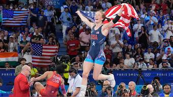 Sarah Hildebrandt of USA celebrates after winning the gold medal in women's 50kg wrestling at Paris Olympics. She was due to face Vinesh Phogat before the Indian was disqualified. AP
