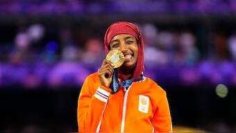 Sifan Hassan became the last athlete at the Paris Olympics to receive a gold medal, standing on top of the women's marathon podium during the closing ceremony at Stade de France. Reuters