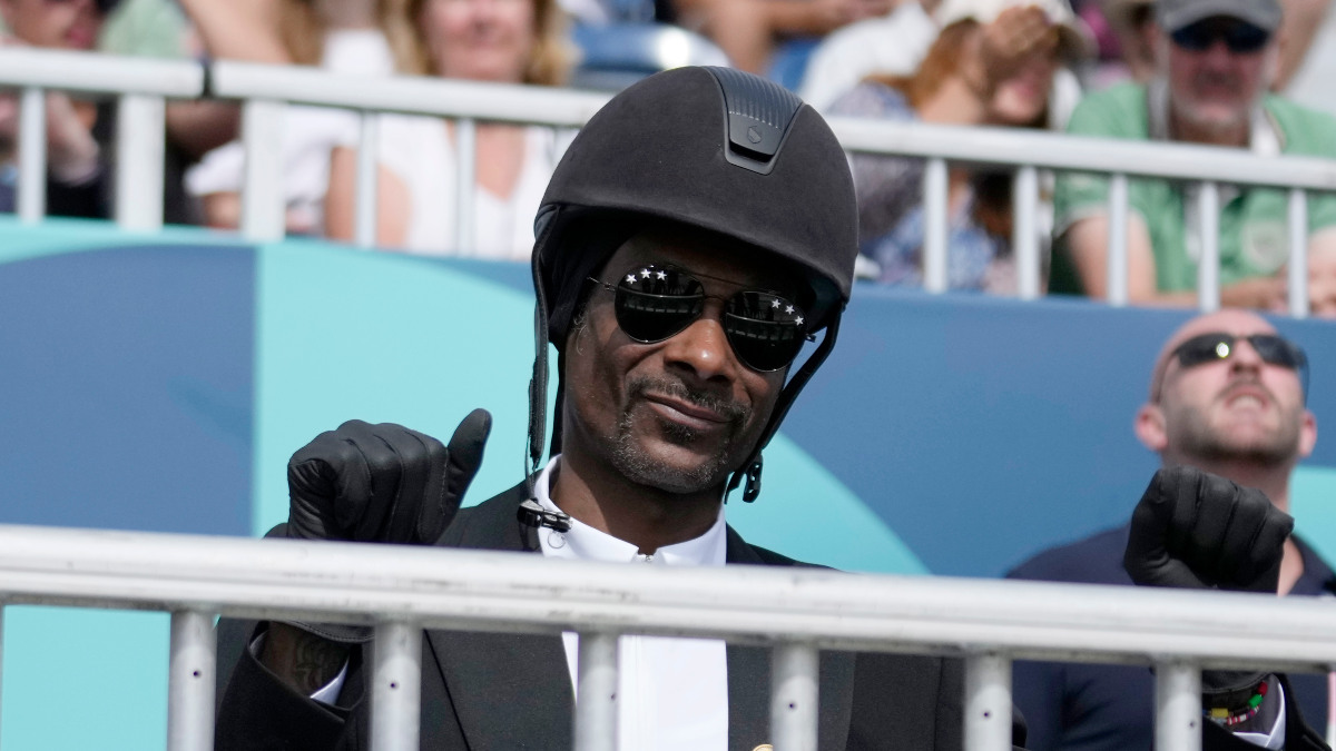 American hip-hop icon Snoop Dogg watches Equestrian events at the Paris Olympics while dressed in full horse-riding gear. AP American hip-hop icon Snoop Dogg watches Equestrian events at the Paris Olympics while dressed in full horse-riding gear. AP