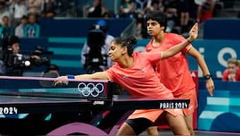 India's Sreeja Akula and Archana Kamath during the doubles fixture in the table tennis women's team quarter-final against Germany in the Paris Olympics. AP