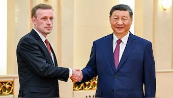 In this photo released by Xinhua News Agency, Chinese President Xi Jinping, right, meets with White House national security adviser Jake Sullivan at the Great Hall of the People in Beijing, capital of China, on Thursday. AP