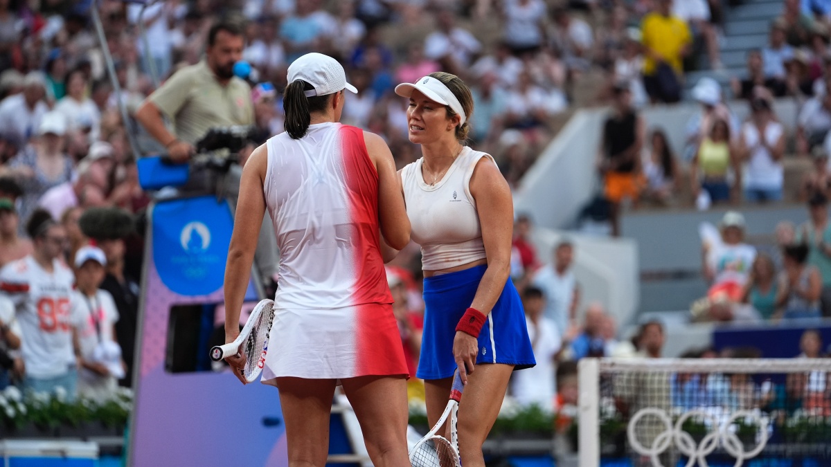 Danielle Collins (R) and Iga Swiatek (L) exchange words after the American retired mid-way into the third set at the Paris Olympics. AP Danielle Collins (R) and Iga Swiatek (L) exchange words after the American retired mid-way into the third set at the Paris Olympics. AP