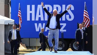 US Vice President and Democratic presidential candidate Kamala Harris' running mate Minnesota Governor Tim Walz gestures during a campaign event in Eau Claire, Wisconsin, US, August 7, 2024. Reuters