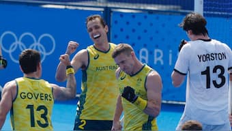 Blake Govers of Australia, Thomas Craig of Australia and Tom Wickham of Australia celebrate a goal at the Paris Olympics. Reuters