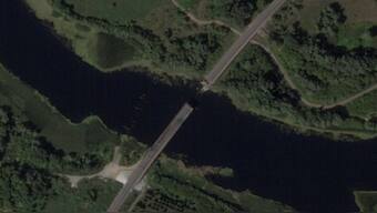 A satellite image shows a bridge collapsed over the Seym river in the Glushkovo district, following a Ukrainian strike in the Kursk region, Russia, August 17, 2024. File Image/Reuters