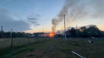 A view shows a building on fire in the town of Sudzha following an incursion of Ukrainian troops into the Kursk region, Russia, in this still image from video taken August 7, 2024. File Image/Reuters