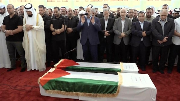 As Iran vows to punish Israel, slain Hamas chief Ismail Haniyeh buried in Qatar