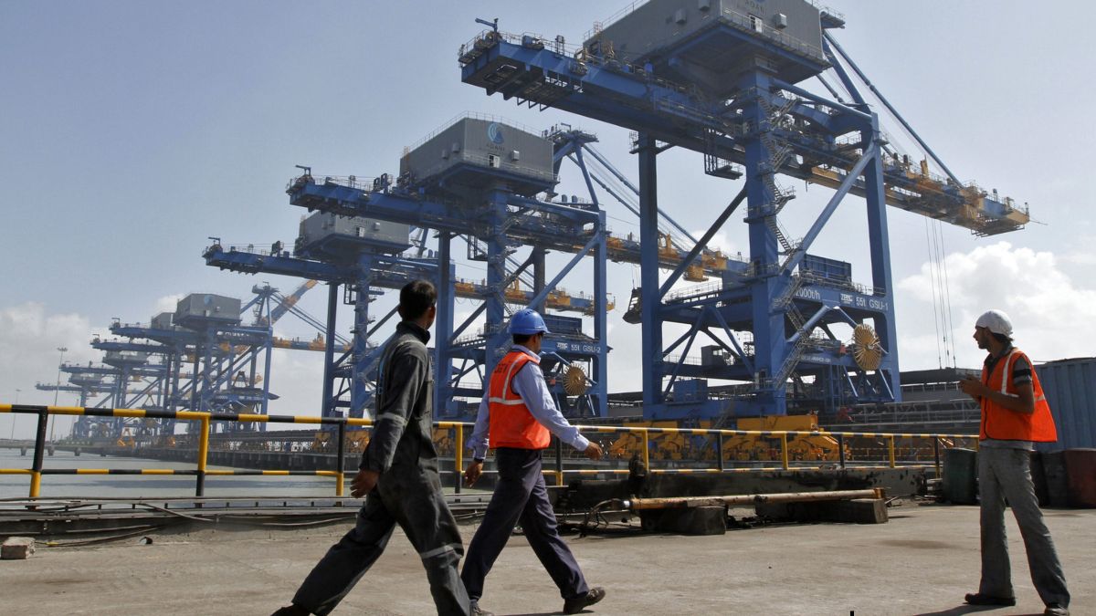 Workers at Mundra port in the Indian state of Gujarat. (Photo: Reuters) Workers at Mundra port in the Indian state of Gujarat. (Photo: Reuters)
