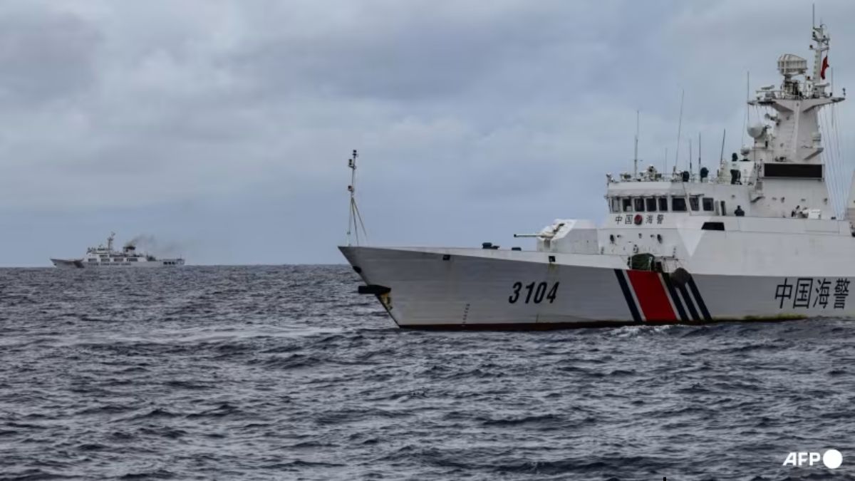 China Coast Guard ships are seen from the Philippine Coast Guard vessel BRP Cabra during a supply mission to Sabina Shoal in disputed waters of the South China Sea on Aug 26, 2024. (Photo: AFP/Jam Sta Rosa) China Coast Guard ships are seen from the Philippine Coast Guard vessel BRP Cabra during a supply mission to Sabina Shoal in disputed waters of the South China Sea on Aug 26, 2024. (Photo: AFP/Jam Sta Rosa)