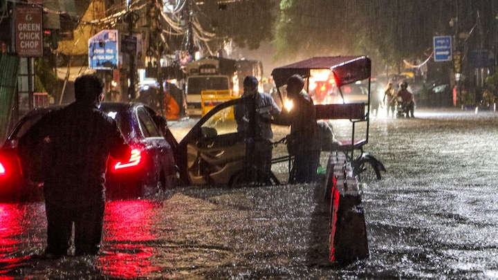 Delhi Deluge: Heavy rains kill 5, schools shut as roads in capital flooded, IMD issues red alert